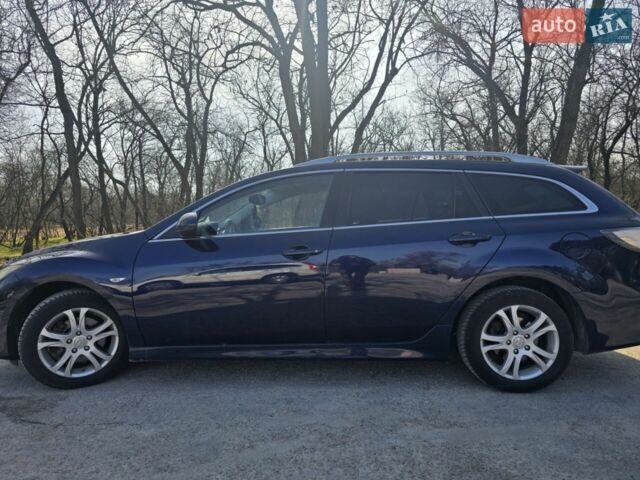 Синий Мазда 6, объемом двигателя 2 л и пробегом 212 тыс. км за 7500 $, фото 6 на Automoto.ua