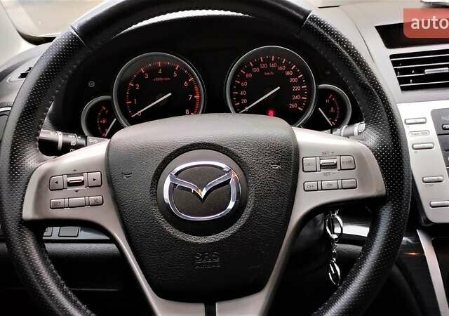 Синій Мазда 6, об'ємом двигуна 1.8 л та пробігом 211 тис. км за 6800 $, фото 18 на Automoto.ua