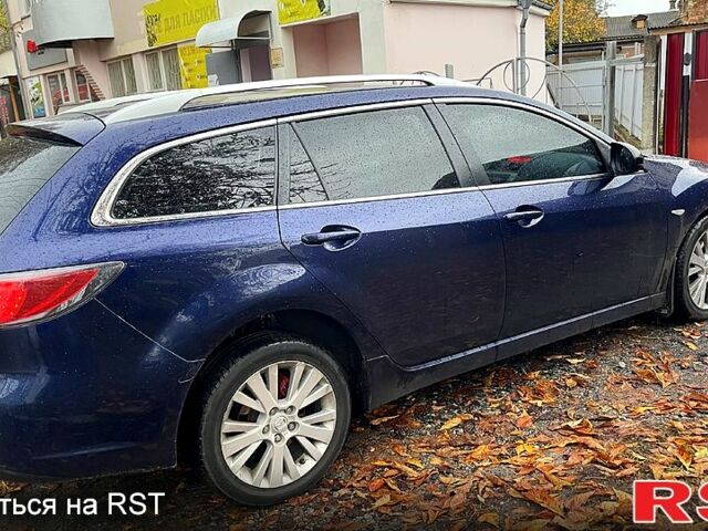 Синій Мазда 6, об'ємом двигуна 2 л та пробігом 245 тис. км за 7750 $, фото 5 на Automoto.ua