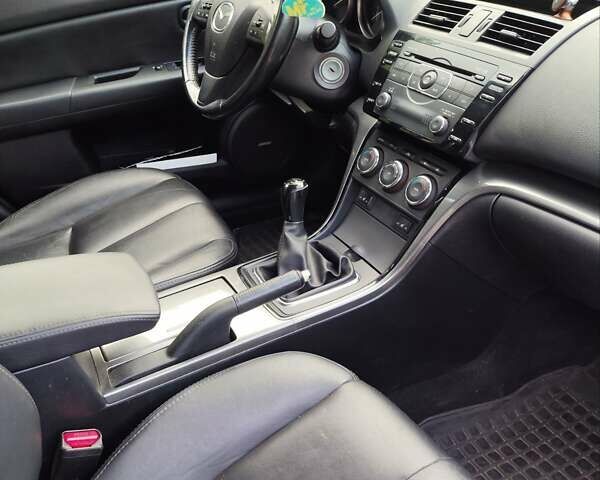 Синій Мазда 6, об'ємом двигуна 2.18 л та пробігом 269 тис. км за 7300 $, фото 11 на Automoto.ua