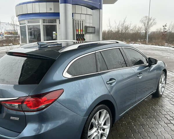 Синій Мазда 6, об'ємом двигуна 2.19 л та пробігом 226 тис. км за 11000 $, фото 4 на Automoto.ua