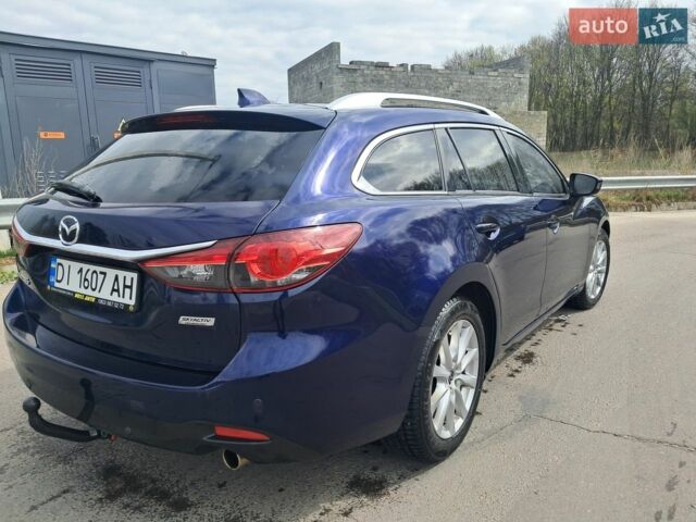 Синий Мазда 6, объемом двигателя 2.18 л и пробегом 240 тыс. км за 9650 $, фото 3 на Automoto.ua