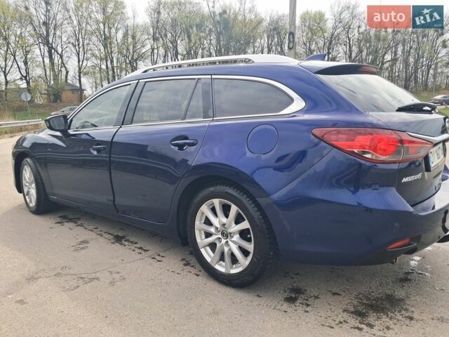 Синий Мазда 6, объемом двигателя 2.18 л и пробегом 240 тыс. км за 9650 $, фото 2 на Automoto.ua