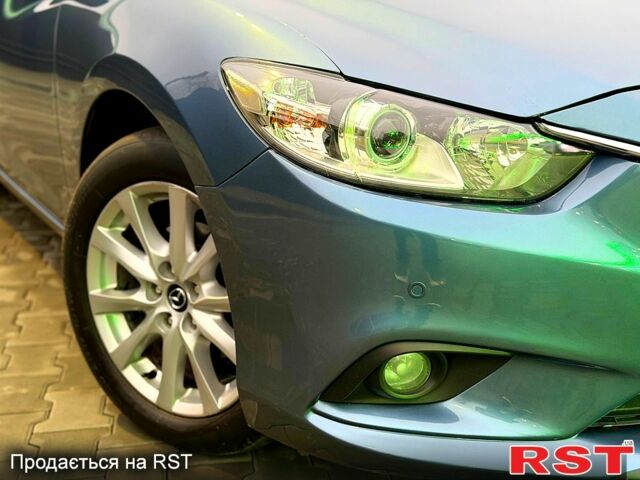 Синий Мазда 6, объемом двигателя 2.2 л и пробегом 230 тыс. км за 11500 $, фото 1 на Automoto.ua