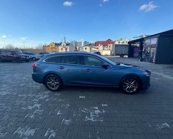 Синій Мазда 6, об'ємом двигуна 2.2 л та пробігом 275 тис. км за 9799 $, фото 7 на Automoto.ua