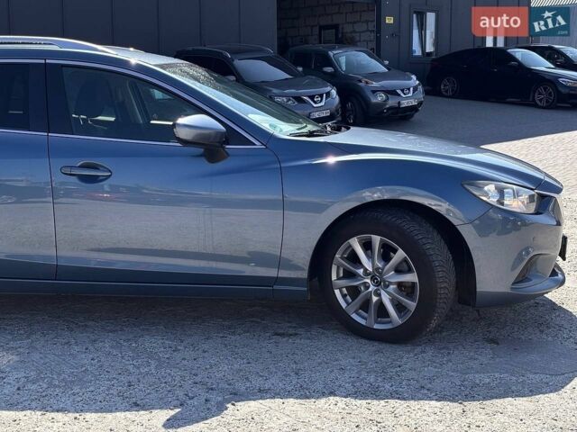 Синій Мазда 6, об'ємом двигуна 2.2 л та пробігом 292 тис. км за 8490 $, фото 10 на Automoto.ua