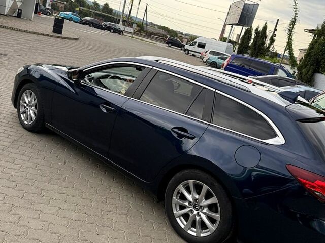 Синій Мазда 6, об'ємом двигуна 2.2 л та пробігом 265 тис. км за 12000 $, фото 5 на Automoto.ua