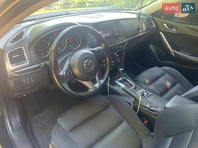 Синий Мазда 6, объемом двигателя 2.19 л и пробегом 209 тыс. км за 10900 $, фото 2 на Automoto.ua