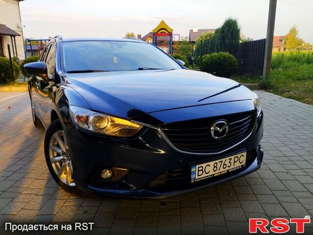 Синий Мазда 6, объемом двигателя 2.2 л и пробегом 208 тыс. км за 12300 $, фото 1 на Automoto.ua