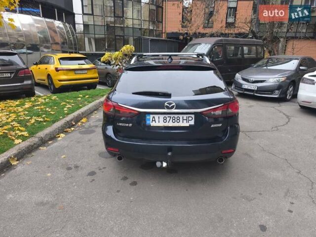 Синий Мазда 6, объемом двигателя 2 л и пробегом 251 тыс. км за 9900 $, фото 1 на Automoto.ua