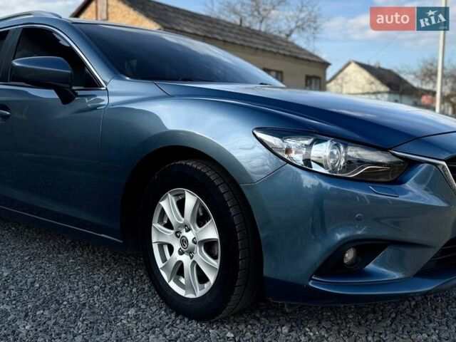 Синий Мазда 6, объемом двигателя 2.2 л и пробегом 209 тыс. км за 11500 $, фото 4 на Automoto.ua