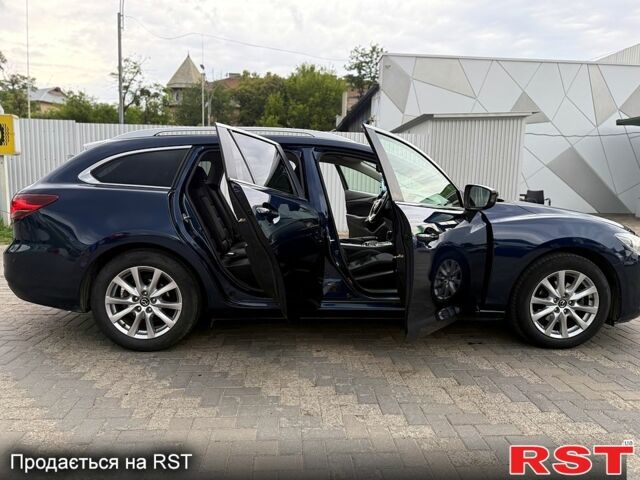 Синий Мазда 6, объемом двигателя 2.2 л и пробегом 265 тыс. км за 11000 $, фото 4 на Automoto.ua