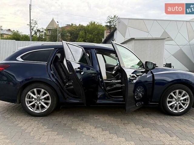 Синій Мазда 6, об'ємом двигуна 2.2 л та пробігом 265 тис. км за 12000 $, фото 4 на Automoto.ua