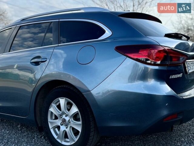 Синий Мазда 6, объемом двигателя 2.2 л и пробегом 209 тыс. км за 11500 $, фото 5 на Automoto.ua