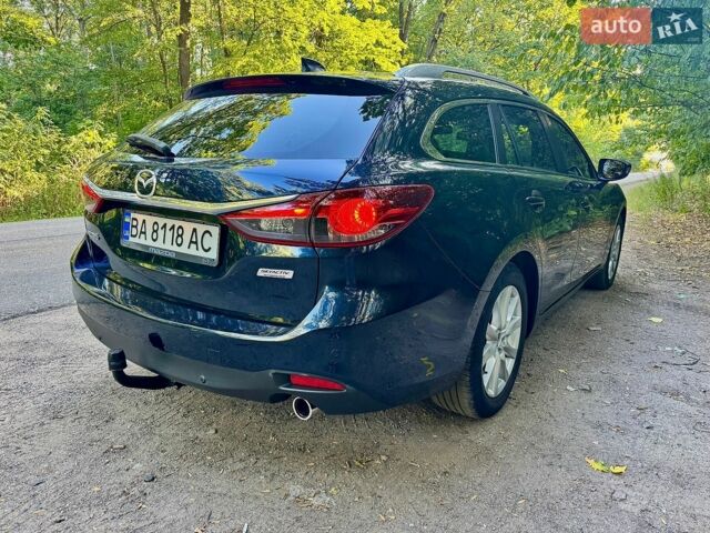 Синий Мазда 6, объемом двигателя 2.18 л и пробегом 267 тыс. км за 11000 $, фото 7 на Automoto.ua