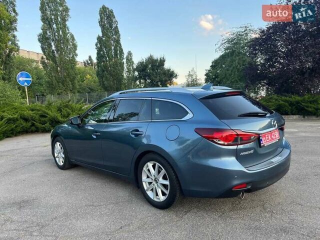 Синий Мазда 6, объемом двигателя 2.18 л и пробегом 250 тыс. км за 11500 $, фото 4 на Automoto.ua