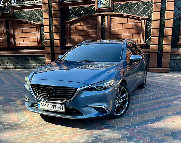 Синий Мазда 6, объемом двигателя 2.19 л и пробегом 160 тыс. км за 14550 $, фото 5 на Automoto.ua