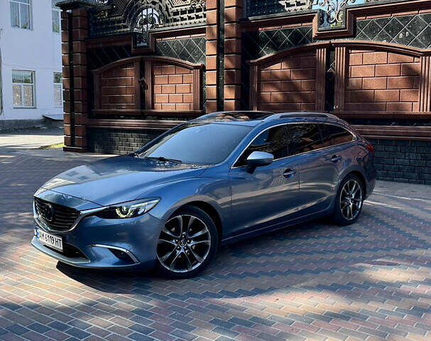 Синий Мазда 6, объемом двигателя 2.19 л и пробегом 160 тыс. км за 14550 $, фото 4 на Automoto.ua