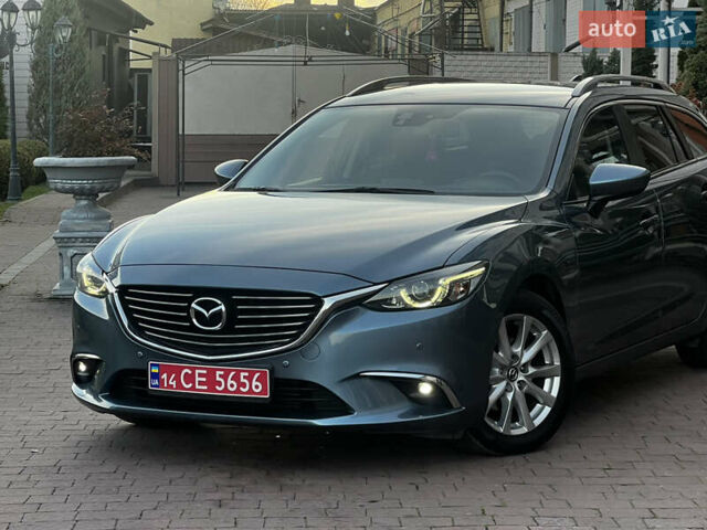 Синій Мазда 6, об'ємом двигуна 2.2 л та пробігом 233 тис. км за 11999 $, фото 4 на Automoto.ua