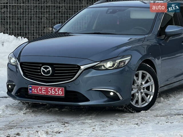 Синій Мазда 6, об'ємом двигуна 2.2 л та пробігом 236 тис. км за 11799 $, фото 4 на Automoto.ua