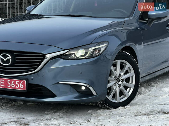Синій Мазда 6, об'ємом двигуна 2.2 л та пробігом 236 тис. км за 11799 $, фото 7 на Automoto.ua