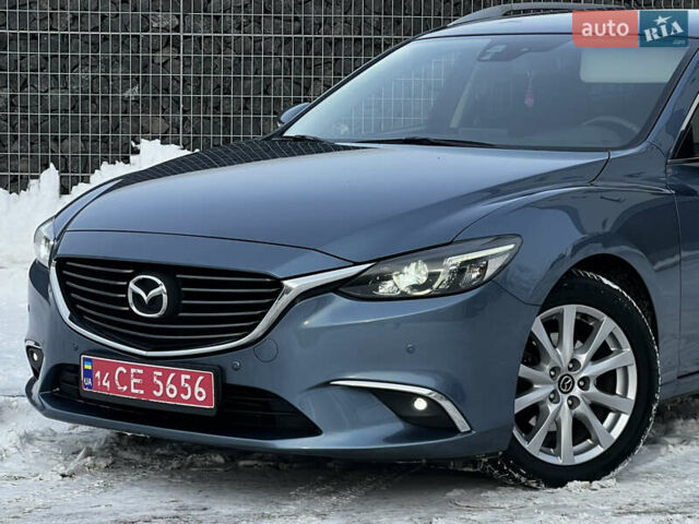 Синій Мазда 6, об'ємом двигуна 2.2 л та пробігом 236 тис. км за 11799 $, фото 6 на Automoto.ua