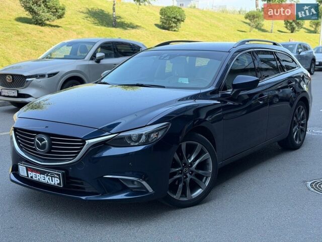 Синій Мазда 6, об'ємом двигуна 2.2 л та пробігом 313 тис. км за 11700 $, фото 2 на Automoto.ua