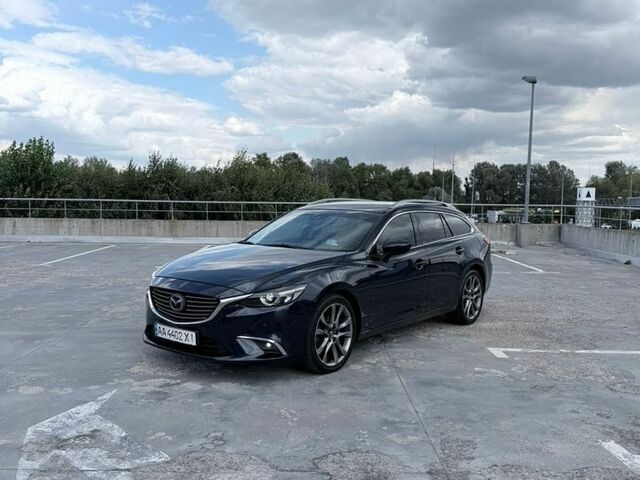 Синий Мазда 6, объемом двигателя 2.19 л и пробегом 300 тыс. км за 10900 $, фото 2 на Automoto.ua
