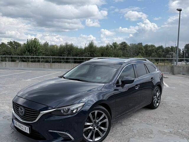 Синий Мазда 6, объемом двигателя 2.19 л и пробегом 300 тыс. км за 10900 $, фото 6 на Automoto.ua