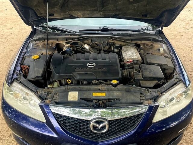 Синий Мазда 6, объемом двигателя 2 л и пробегом 311 тыс. км за 3500 $, фото 1 на Automoto.ua