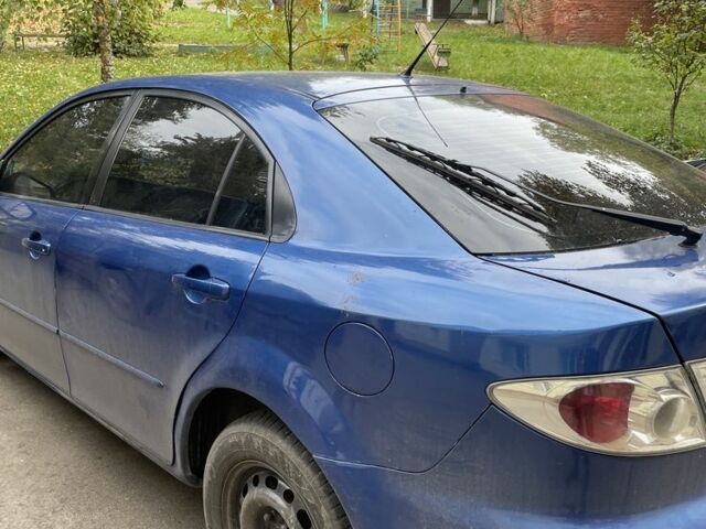 Синій Мазда 6, об'ємом двигуна 2 л та пробігом 325 тис. км за 2850 $, фото 13 на Automoto.ua