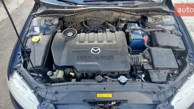 Синий Мазда 6, объемом двигателя 1.8 л и пробегом 250 тыс. км за 4500 $, фото 2 на Automoto.ua