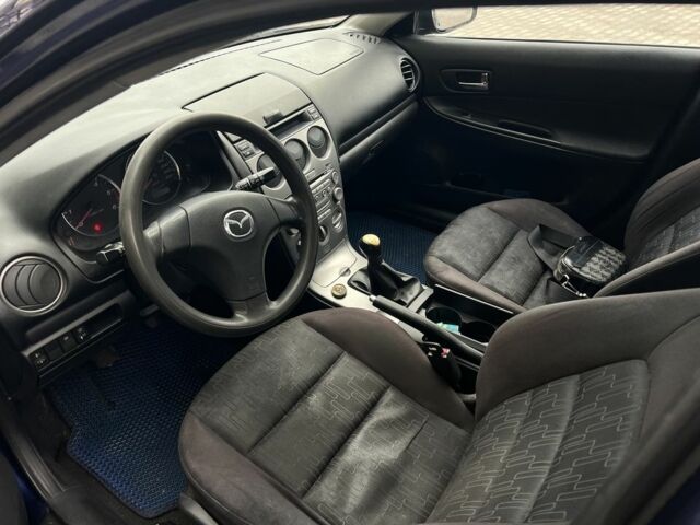 Синий Мазда 6, объемом двигателя 2 л и пробегом 299 тыс. км за 2649 $, фото 6 на Automoto.ua