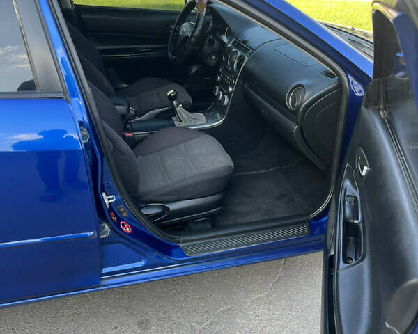 Синій Мазда 6, об'ємом двигуна 2 л та пробігом 331 тис. км за 3800 $, фото 9 на Automoto.ua