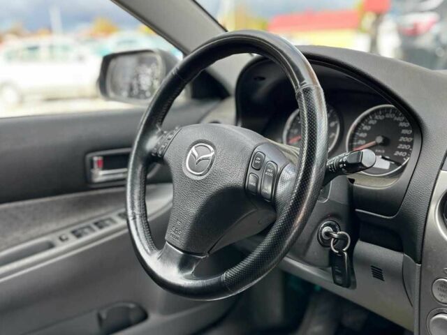 Синий Мазда 6, объемом двигателя 1.8 л и пробегом 199 тыс. км за 4400 $, фото 17 на Automoto.ua