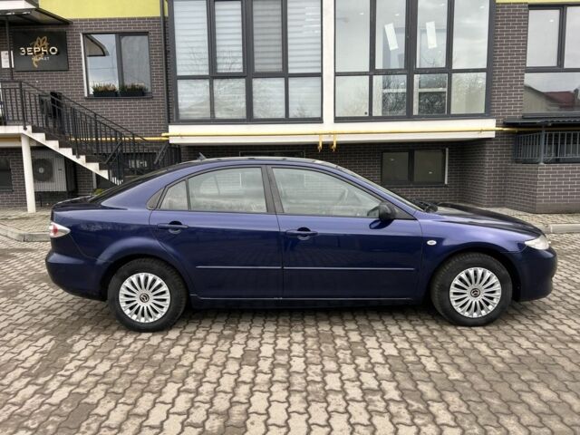 Синий Мазда 6, объемом двигателя 2 л и пробегом 299 тыс. км за 2649 $, фото 4 на Automoto.ua