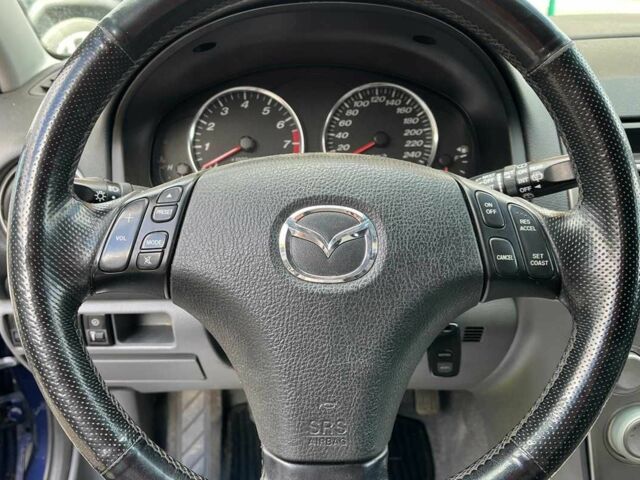 Синий Мазда 6, объемом двигателя 1.8 л и пробегом 199 тыс. км за 4400 $, фото 12 на Automoto.ua