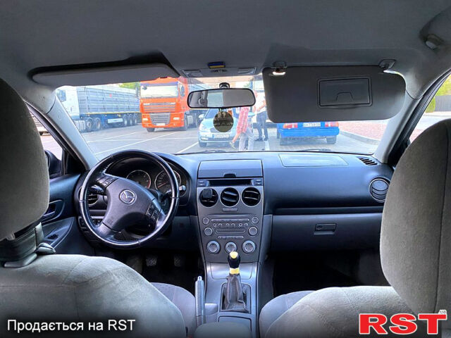 Синий Мазда 6, объемом двигателя 2 л и пробегом 223 тыс. км за 2150 $, фото 13 на Automoto.ua