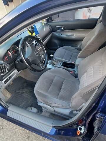 Синий Мазда 6, объемом двигателя 1.8 л и пробегом 250 тыс. км за 4500 $, фото 4 на Automoto.ua