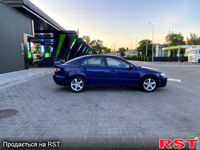 Синий Мазда 6, объемом двигателя 2 л и пробегом 223 тыс. км за 2150 $, фото 4 на Automoto.ua