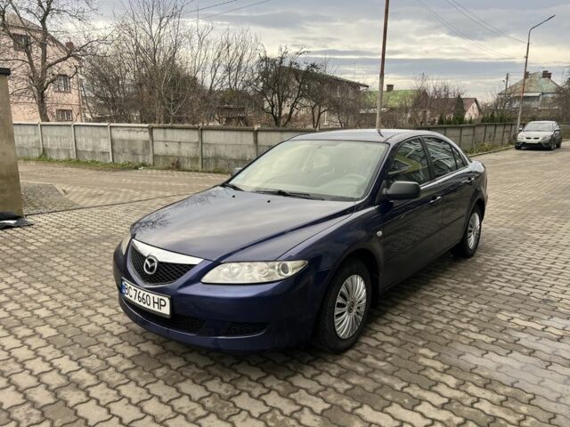 Синий Мазда 6, объемом двигателя 2 л и пробегом 299 тыс. км за 2649 $, фото 1 на Automoto.ua