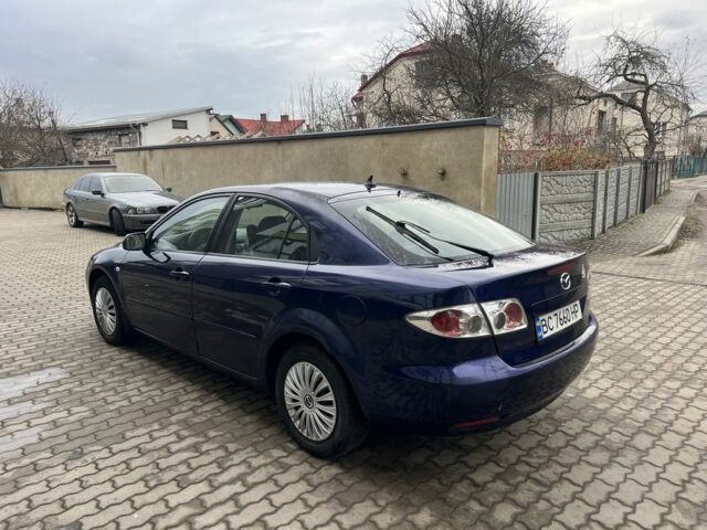 Синий Мазда 6, объемом двигателя 2 л и пробегом 299 тыс. км за 2649 $, фото 2 на Automoto.ua