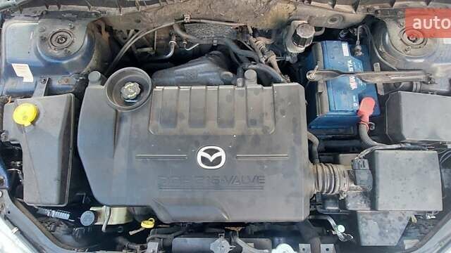 Синий Мазда 6, объемом двигателя 1.8 л и пробегом 250 тыс. км за 4500 $, фото 1 на Automoto.ua