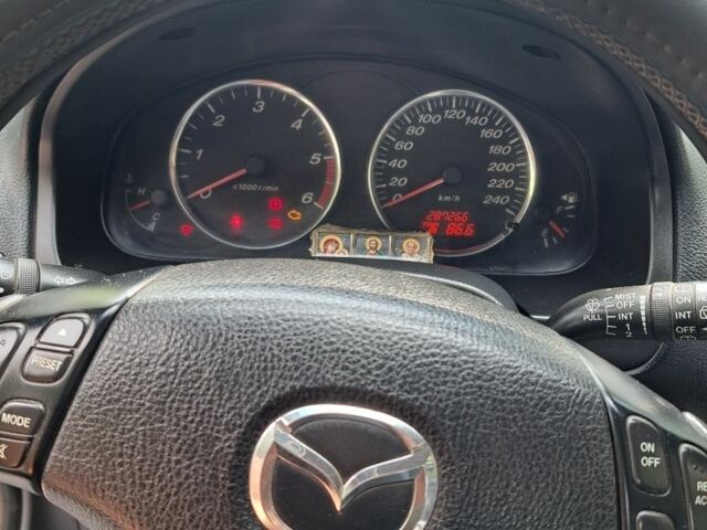 Синий Мазда 6, объемом двигателя 2 л и пробегом 200 тыс. км за 4100 $, фото 7 на Automoto.ua