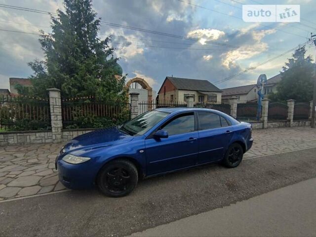 Синий Мазда 6, объемом двигателя 2 л и пробегом 310 тыс. км за 2800 $, фото 4 на Automoto.ua
