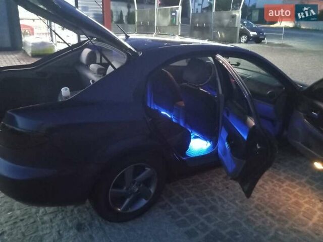 Синий Мазда 6, объемом двигателя 2 л и пробегом 354 тыс. км за 3500 $, фото 1 на Automoto.ua