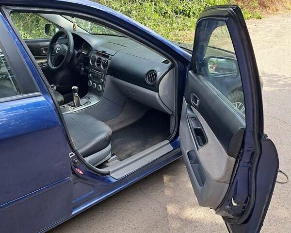 Синій Мазда 6, об'ємом двигуна 2 л та пробігом 200 тис. км за 4700 $, фото 5 на Automoto.ua