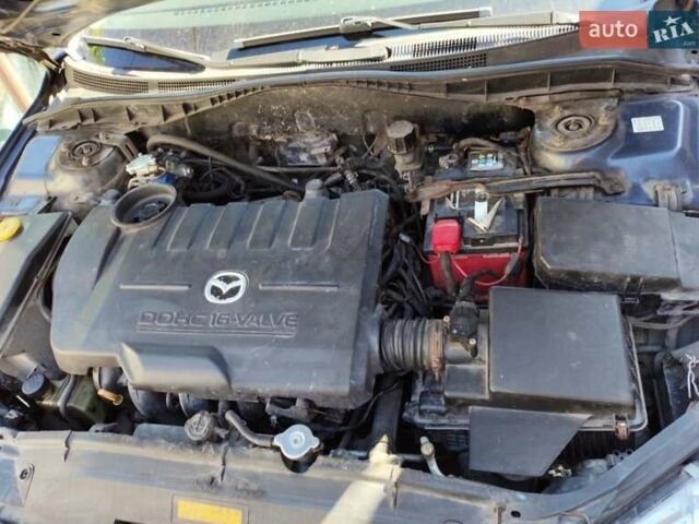 Синий Мазда 6, объемом двигателя 2 л и пробегом 257 тыс. км за 3300 $, фото 10 на Automoto.ua
