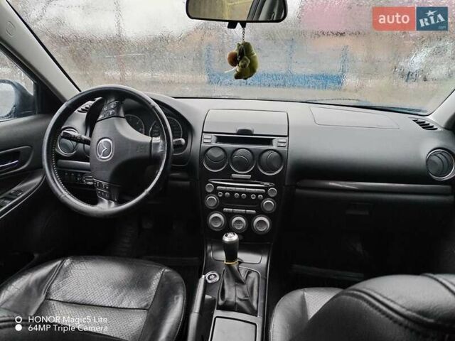 Синий Мазда 6, объемом двигателя 2 л и пробегом 340 тыс. км за 3700 $, фото 9 на Automoto.ua