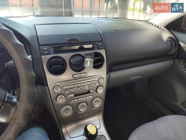 Синий Мазда 6, объемом двигателя 2 л и пробегом 257 тыс. км за 3300 $, фото 23 на Automoto.ua